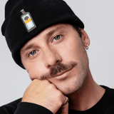 Jägermeister® Geborduurde pet van biologisch katoen