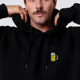 Maßkrug geborduurde unisex hoodie van biologisch katoen