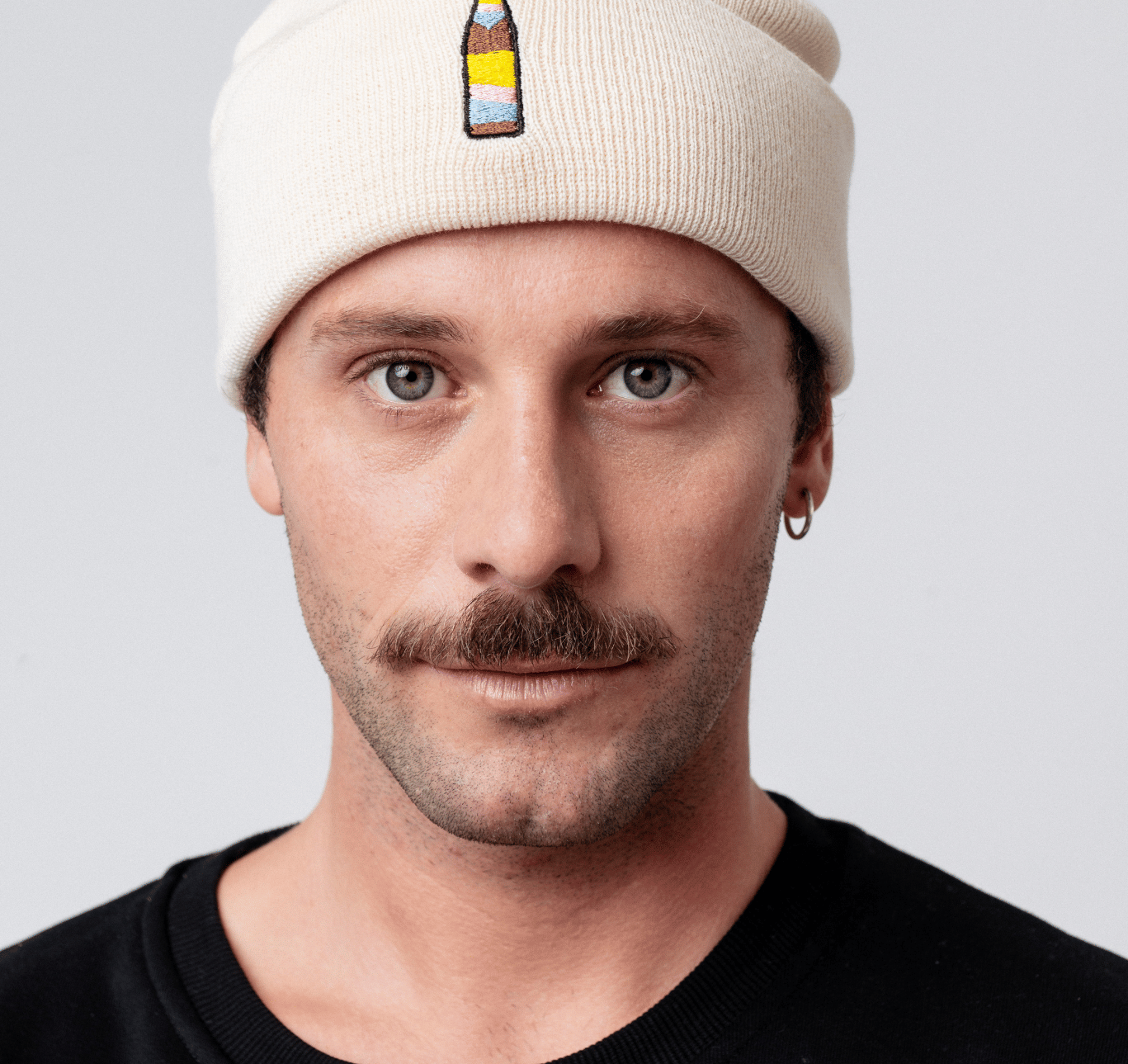 Cola Mix | Geborduurde muts van biologisch katoen