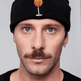 Geborduurde muts van biologisch katoen